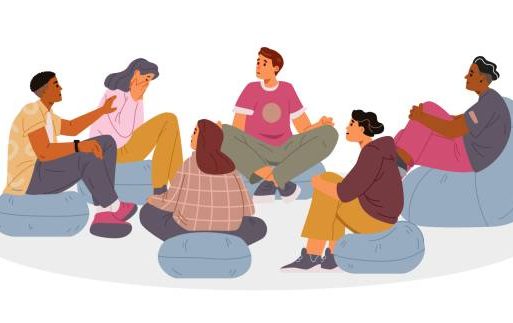 Phiona Hutton Counsellor and Integrative therapist, in person Havant, Hampshire or online nationwide. A diverse group of six people sitting in a circle, engaged in conversation.
